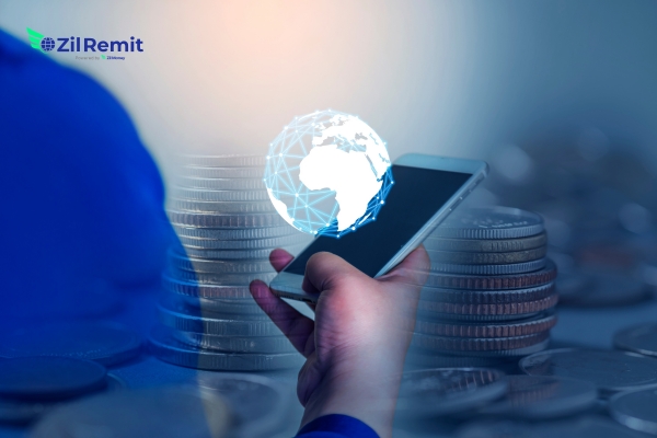 Professional businesswoman using international payment solutions on mobile device with digital globe overlay - ZilRemit B2B cross-border payment platform